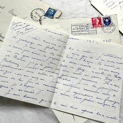 Set of 5 1950s French handwritten letters with envelopes, visible postage stamps and cursive text in French.