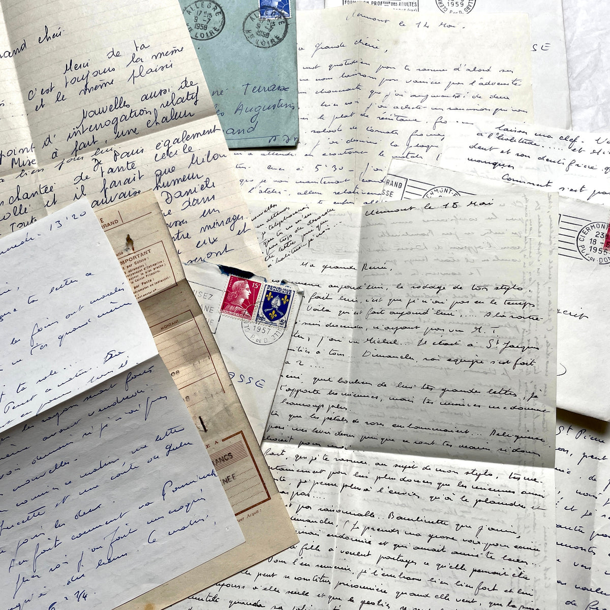 1950s French handwritten letters and envelopes with vintage stamps and postmarks, authentic paper ephemera.