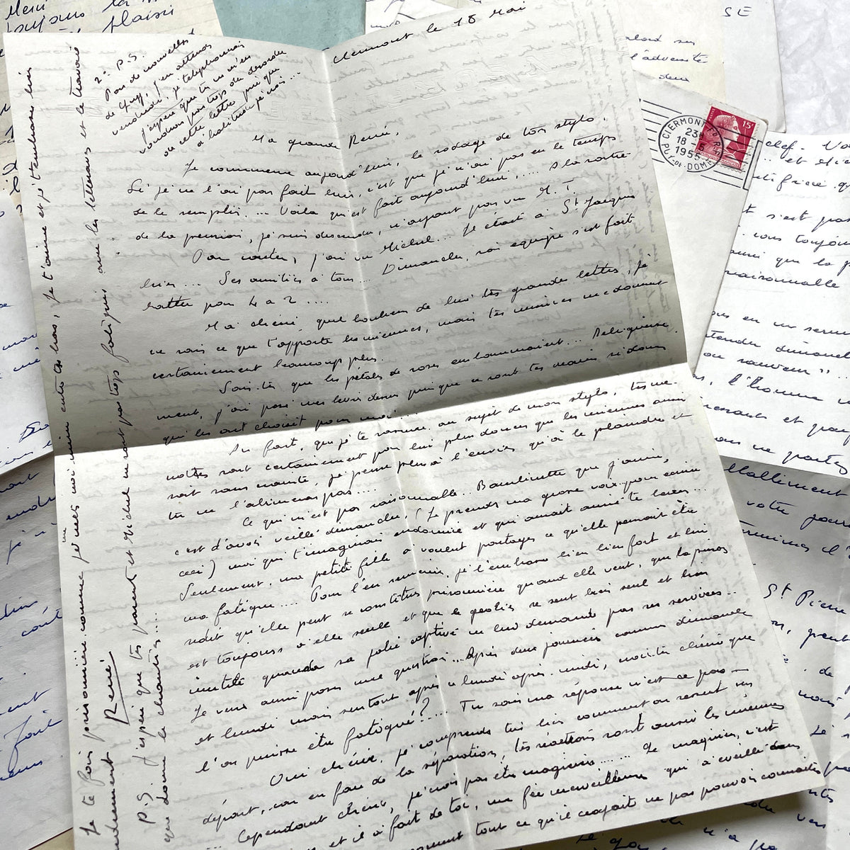 1950s French handwritten letters and envelopes with vintage stamps and postmarks, authentic paper ephemera.