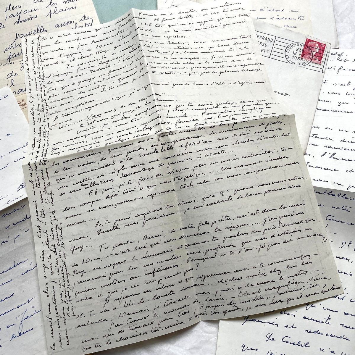1950s French handwritten letters and envelopes with vintage stamps and postmarks, authentic paper ephemera.