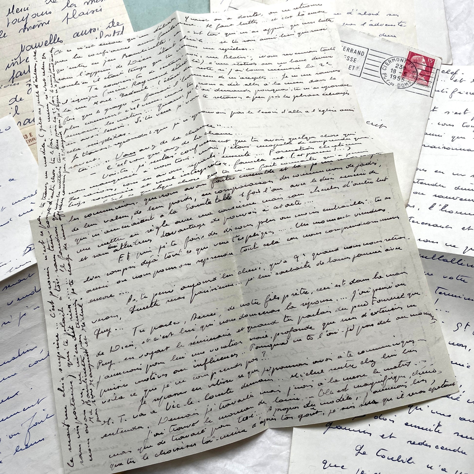 1950s French handwritten letters and envelopes with vintage stamps and postmarks, authentic paper ephemera.