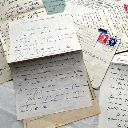 1950s French handwritten letters and envelopes with vintage stamps and postmarks, authentic paper ephemera.