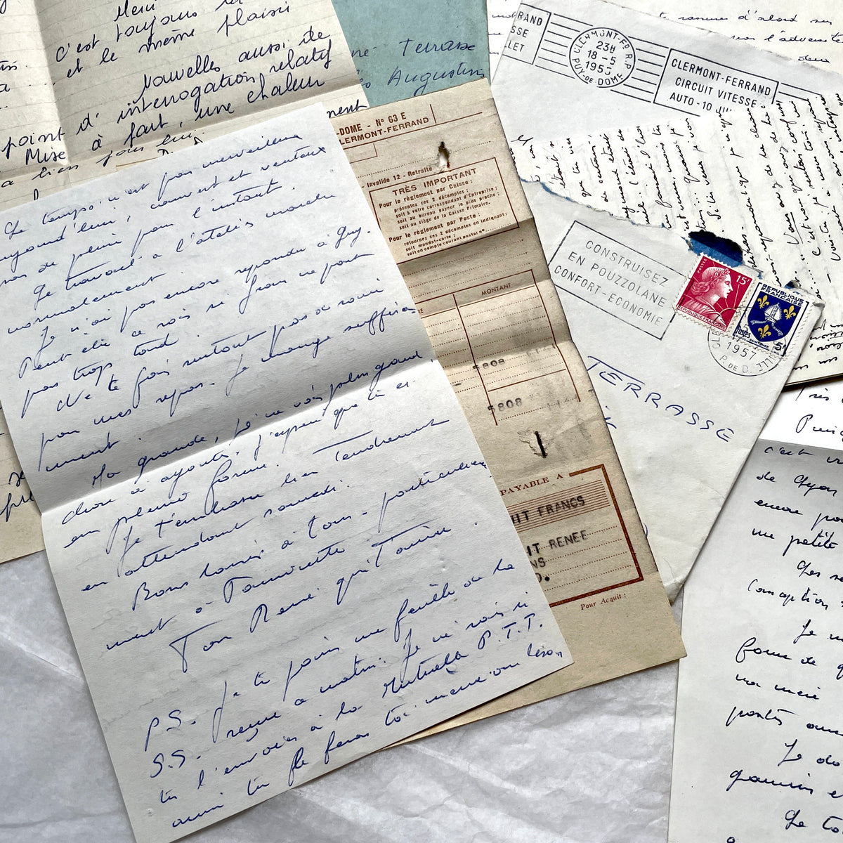 1950s French handwritten letters and envelopes with vintage stamps and postmarks, authentic paper ephemera.