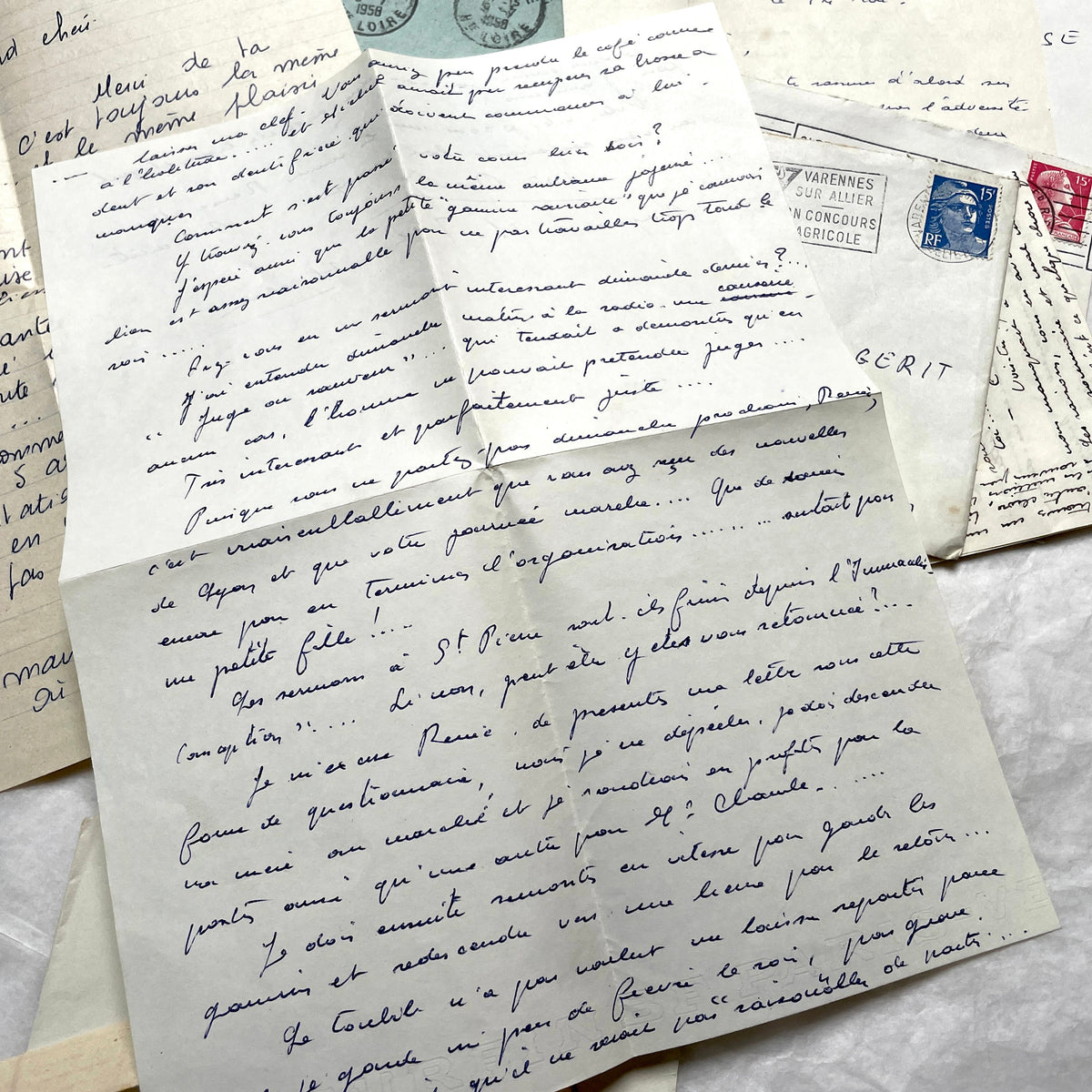 1950s French handwritten letters and envelopes with vintage stamps and postmarks, authentic paper ephemera.