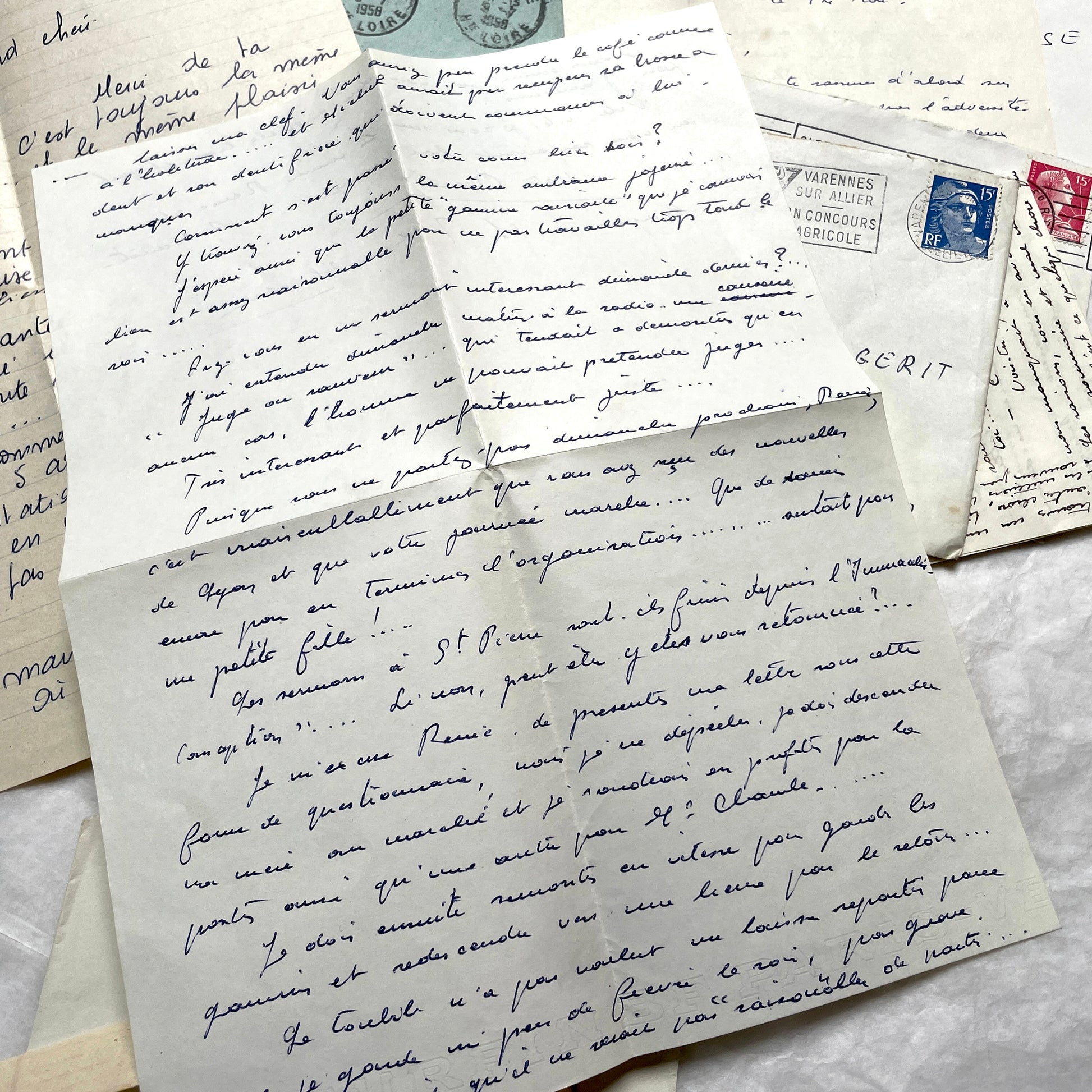 1950s French handwritten letters and envelopes with vintage stamps and postmarks, authentic paper ephemera.