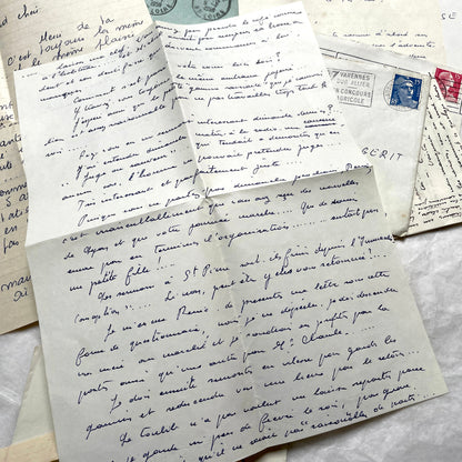 1950s French handwritten letters and envelopes with vintage stamps and postmarks, authentic paper ephemera.