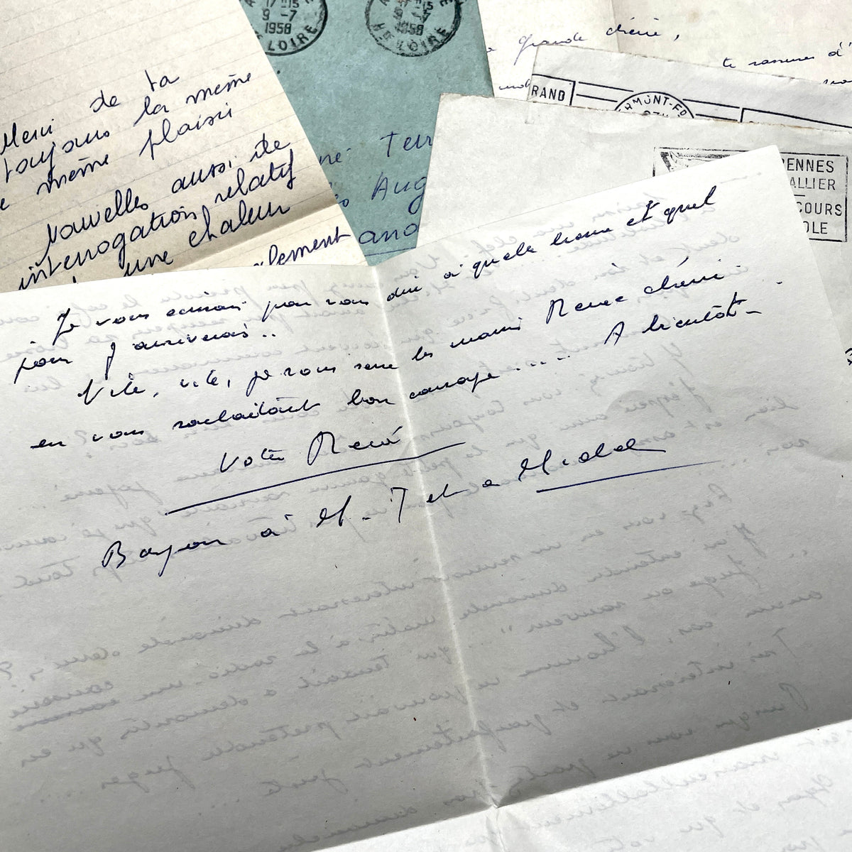 1950s French handwritten letters and envelopes with vintage stamps and postmarks, authentic paper ephemera.