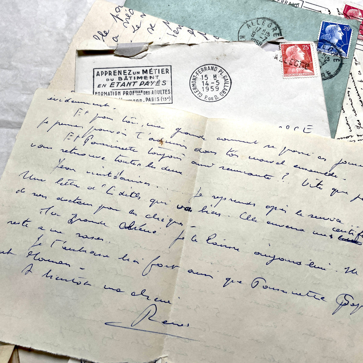 1950s French handwritten letters and envelopes with vintage stamps and postmarks, authentic paper ephemera.