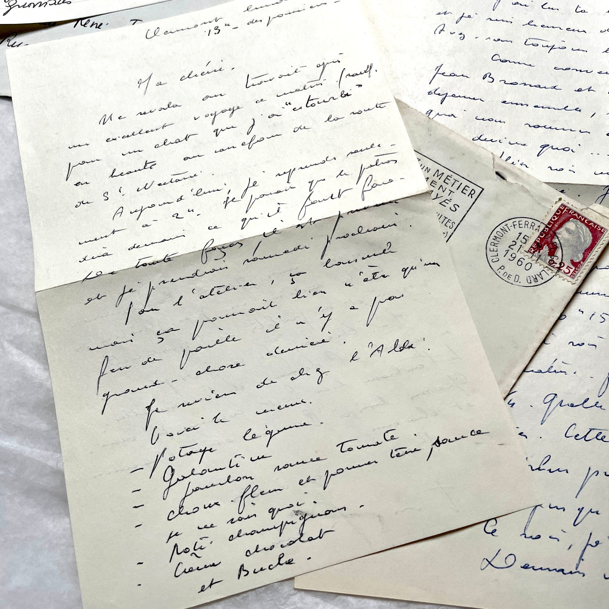 1950s French letters set with handwritten text, envelopes, and vintage postage stamps from Clermont-Ferrand.