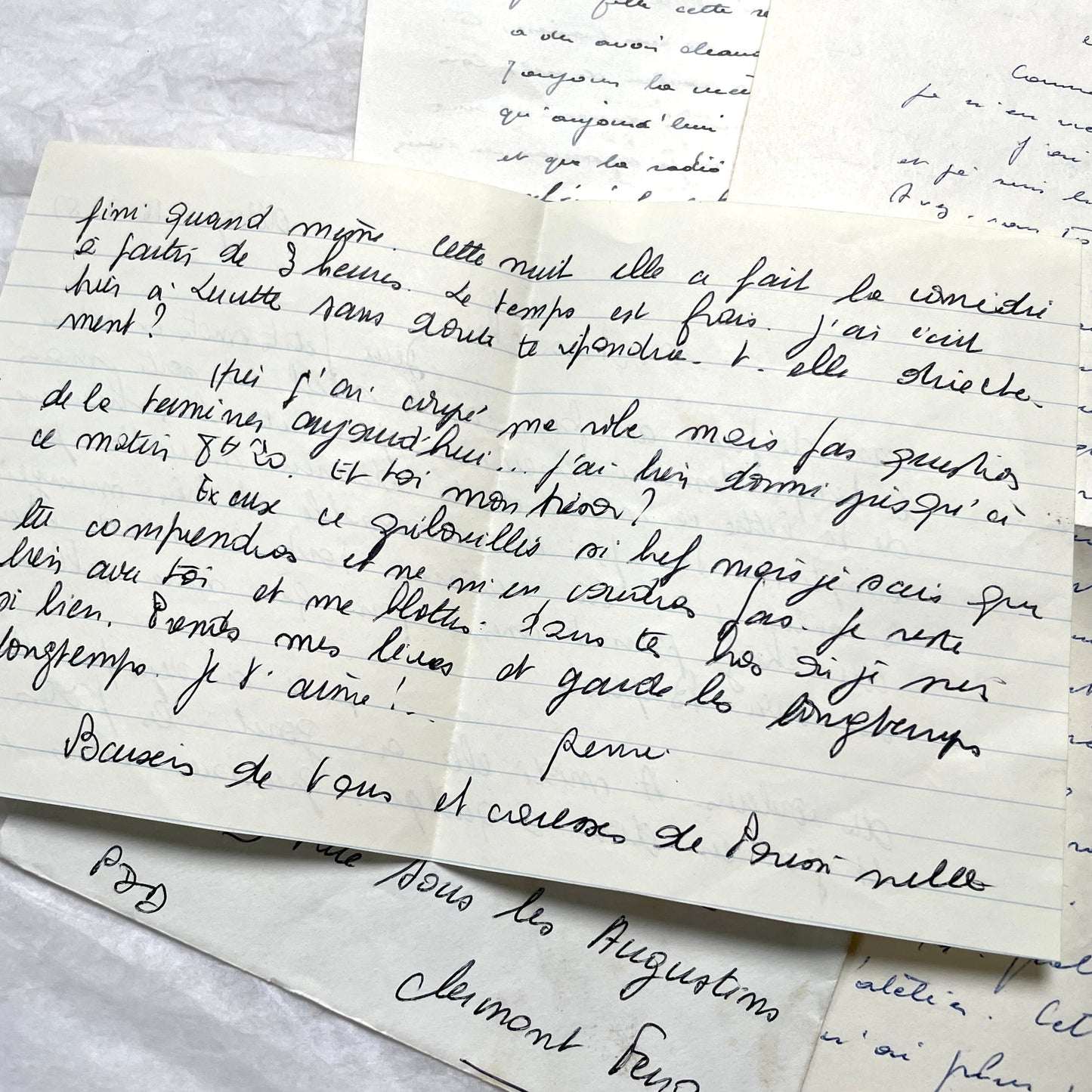 1950s French letters set with handwritten text, envelopes, and vintage postage stamps from Clermont-Ferrand.
