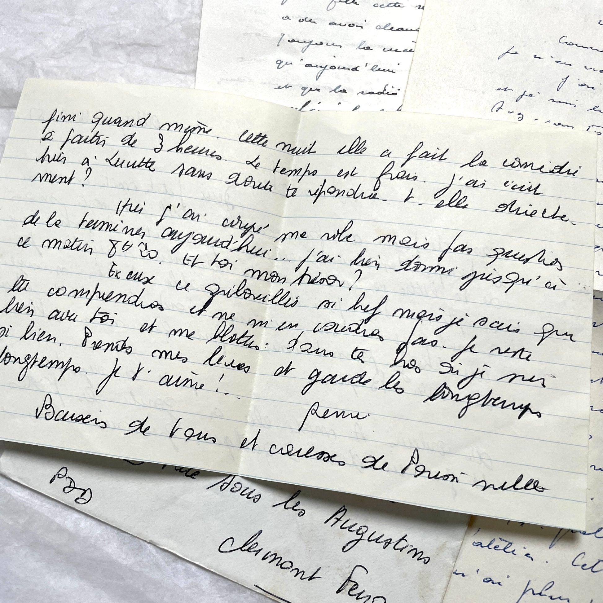 1950s French letters set with handwritten text, envelopes, and vintage postage stamps from Clermont-Ferrand.