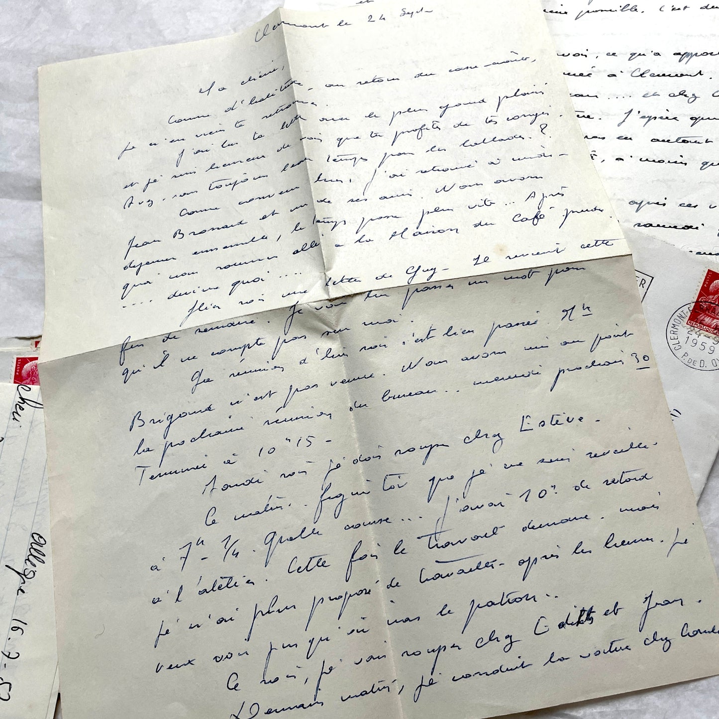 1950s French letters set with handwritten text, envelopes, and vintage postage stamps from Clermont-Ferrand.