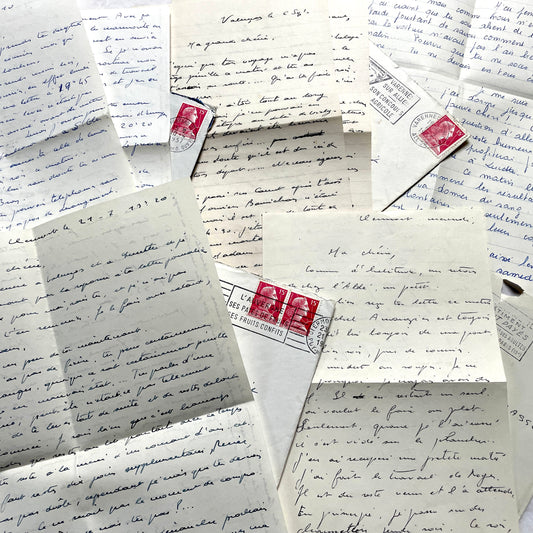 1940s French letters set with envelopes, showing handwritten text and vintage postage stamps.