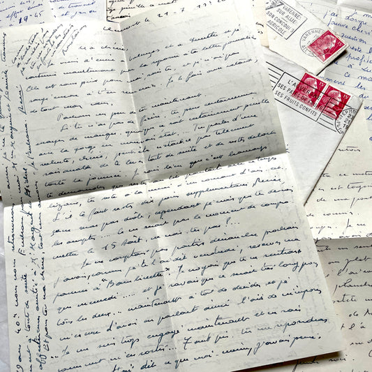 1940s French letters set with envelopes, showing handwritten text and vintage postage stamps.