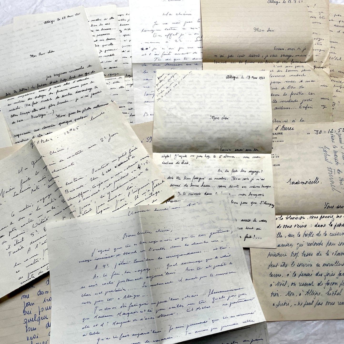 1950s French handwritten letters set with various penmanship styles and vintage paper textures.