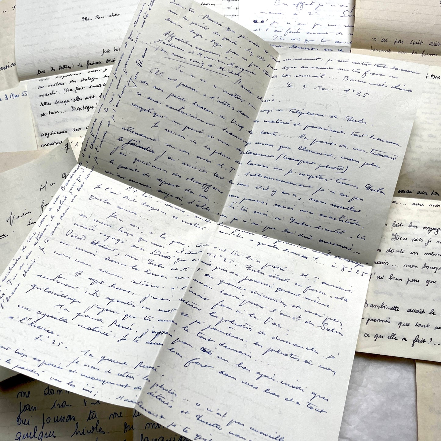1950s French handwritten letters set with various penmanship styles and vintage paper textures.