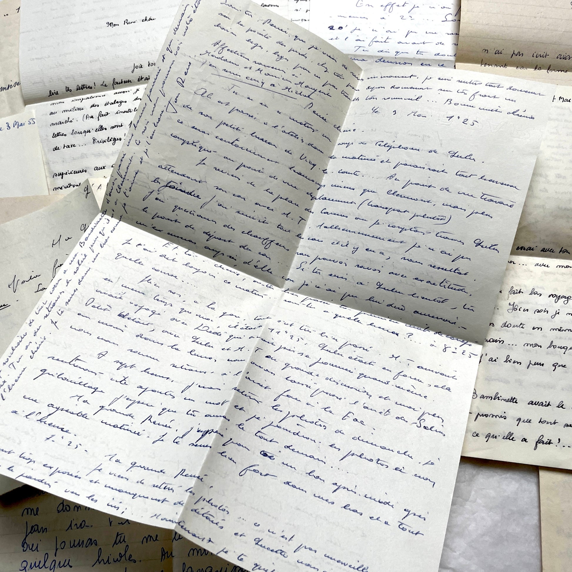 1950s French handwritten letters set with various penmanship styles and vintage paper textures.