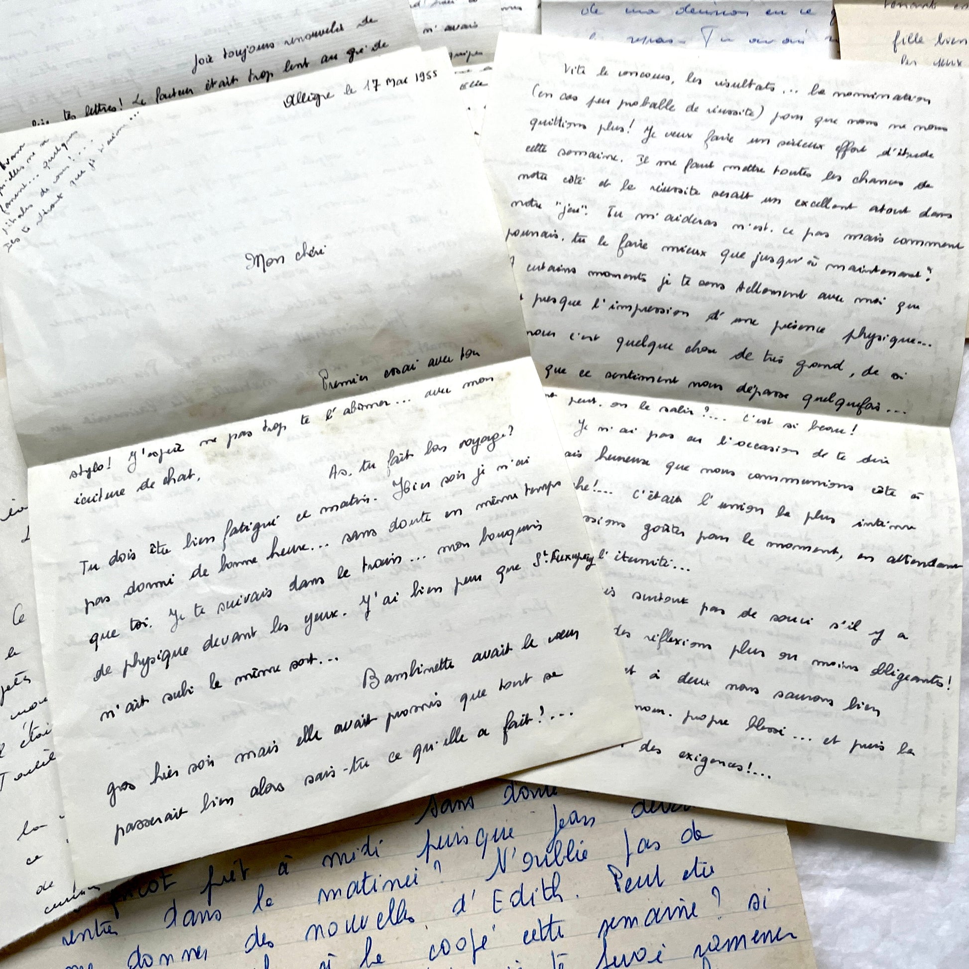 1950s French handwritten letters set with various penmanship styles and vintage paper textures.