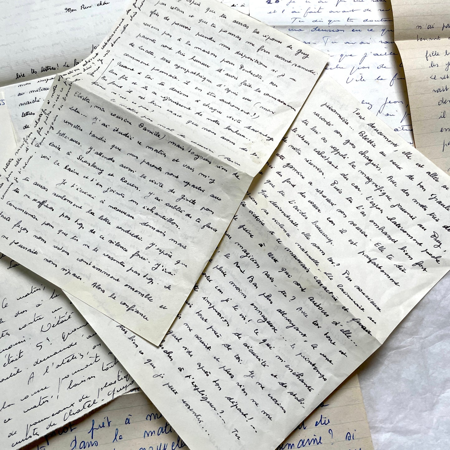 1950s French handwritten letters set with various penmanship styles and vintage paper textures.