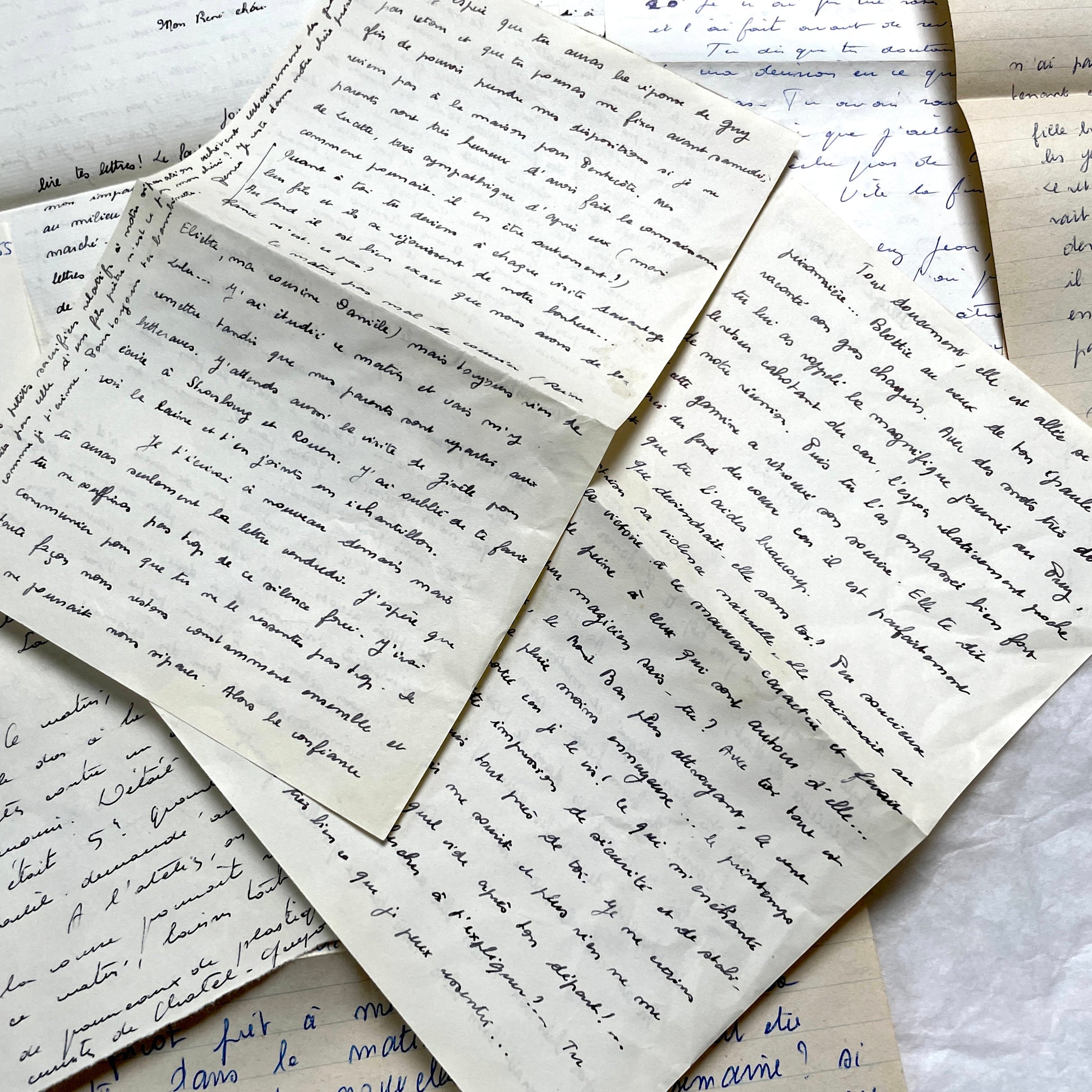 1950s French handwritten letters set with various penmanship styles and vintage paper textures.