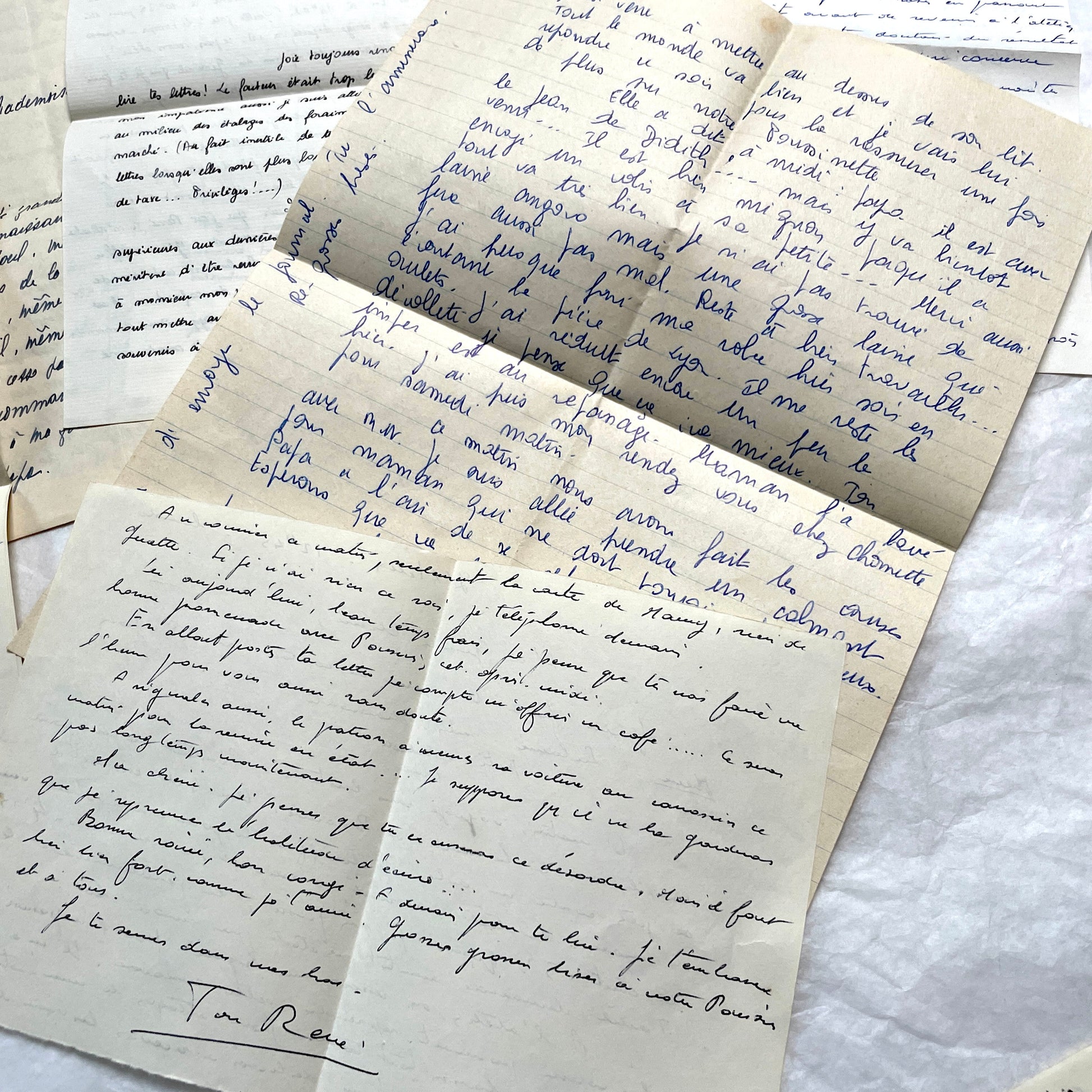 1950s French handwritten letters set with various penmanship styles and vintage paper textures.