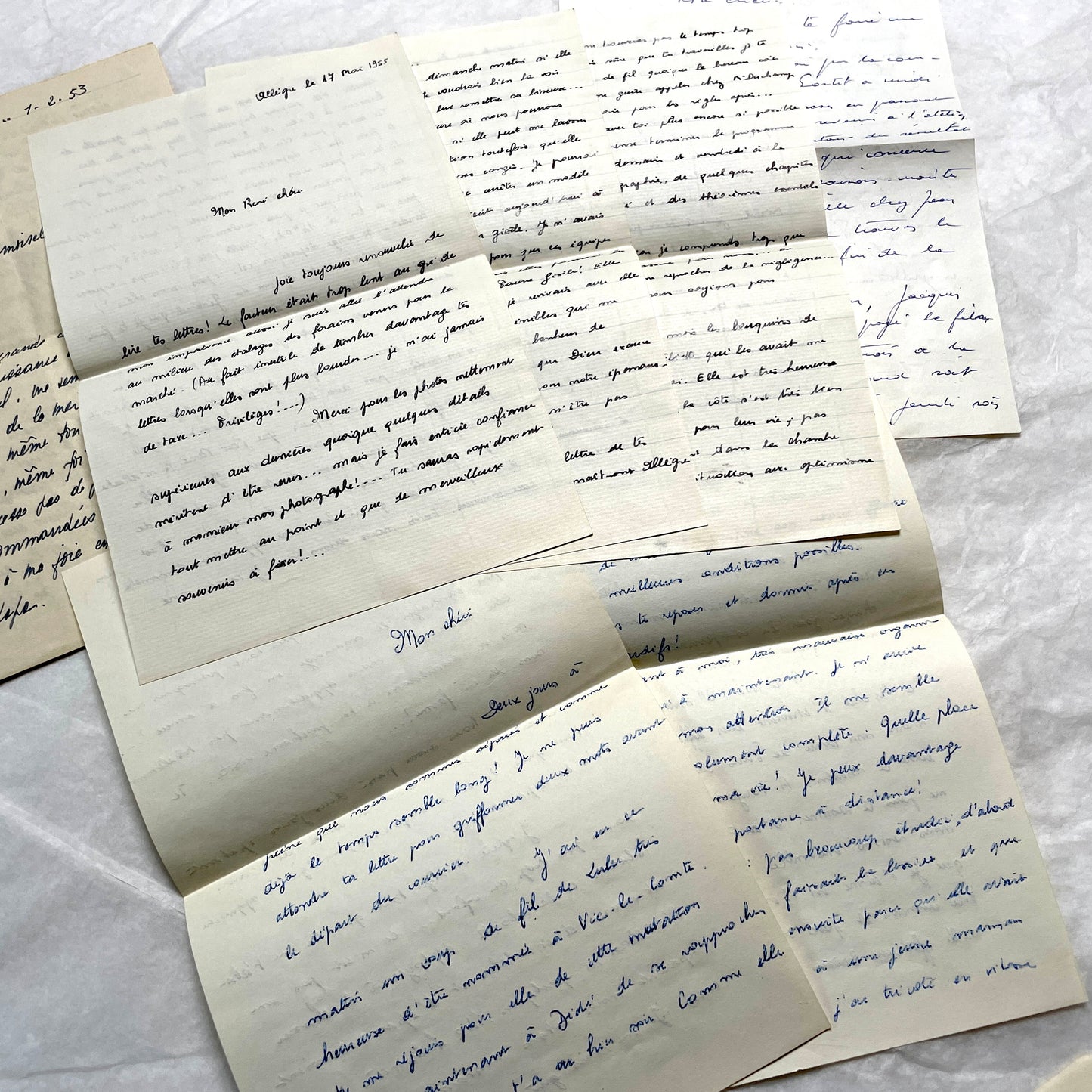 1950s French handwritten letters set with various penmanship styles and vintage paper textures.