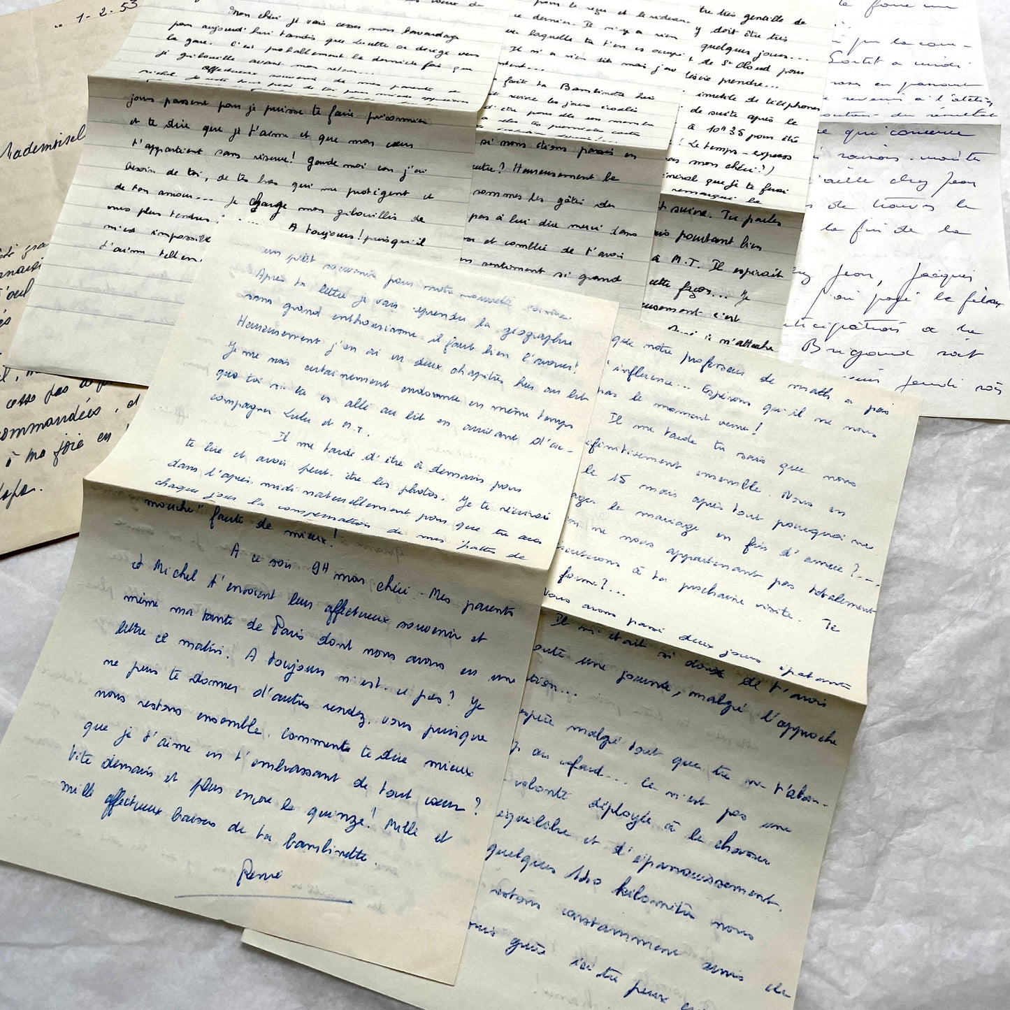 1950s French handwritten letters set with various penmanship styles and vintage paper textures.
