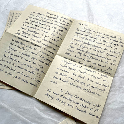 1950s French handwritten letters set with various penmanship styles and vintage paper textures.
