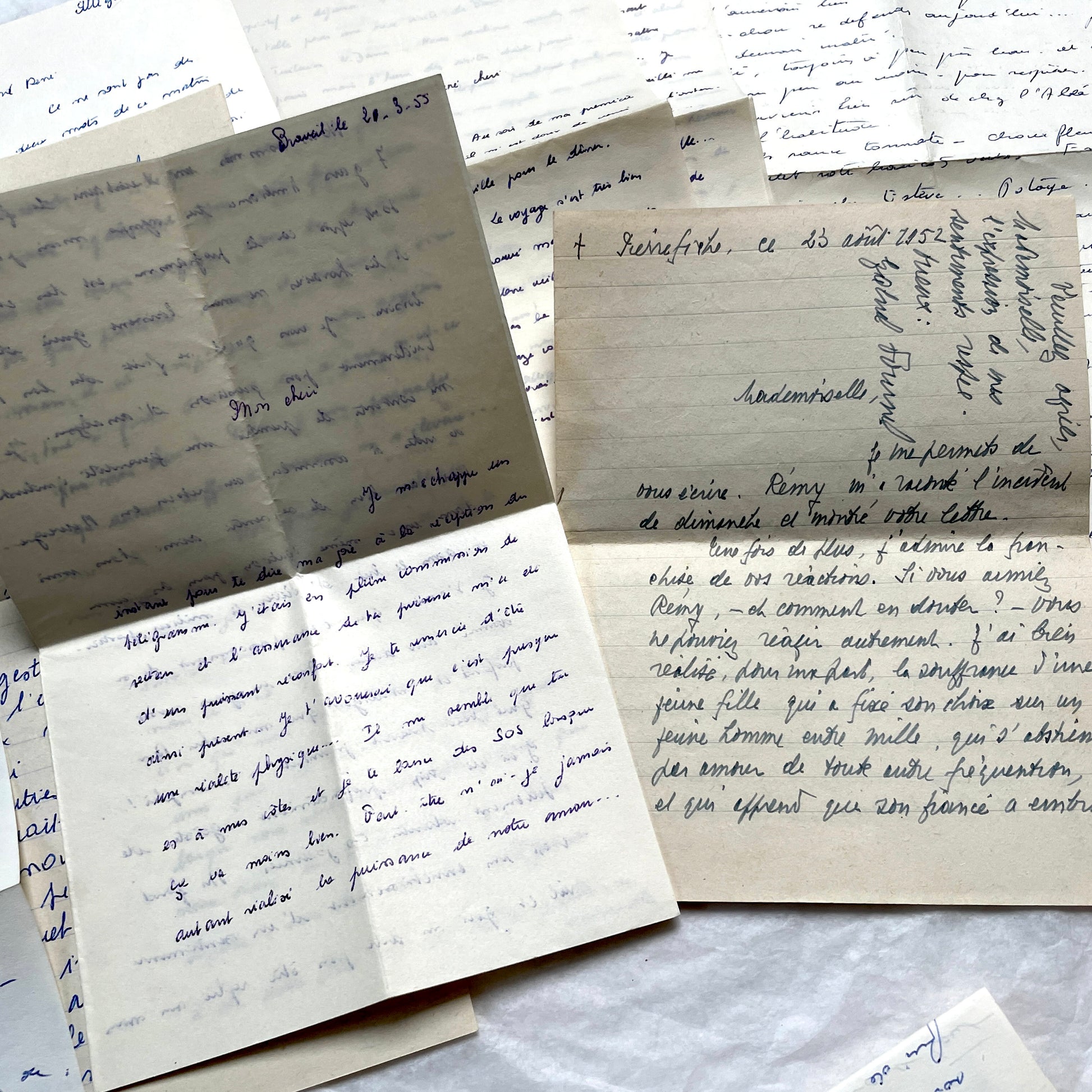 Set of 10 handwritten French letters from the 1950s, featuring various vintage paper and cursive script.