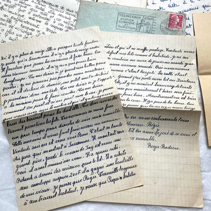 Five 1950s French handwritten letters with envelopes, showing vintage stamps and unique cursive script.