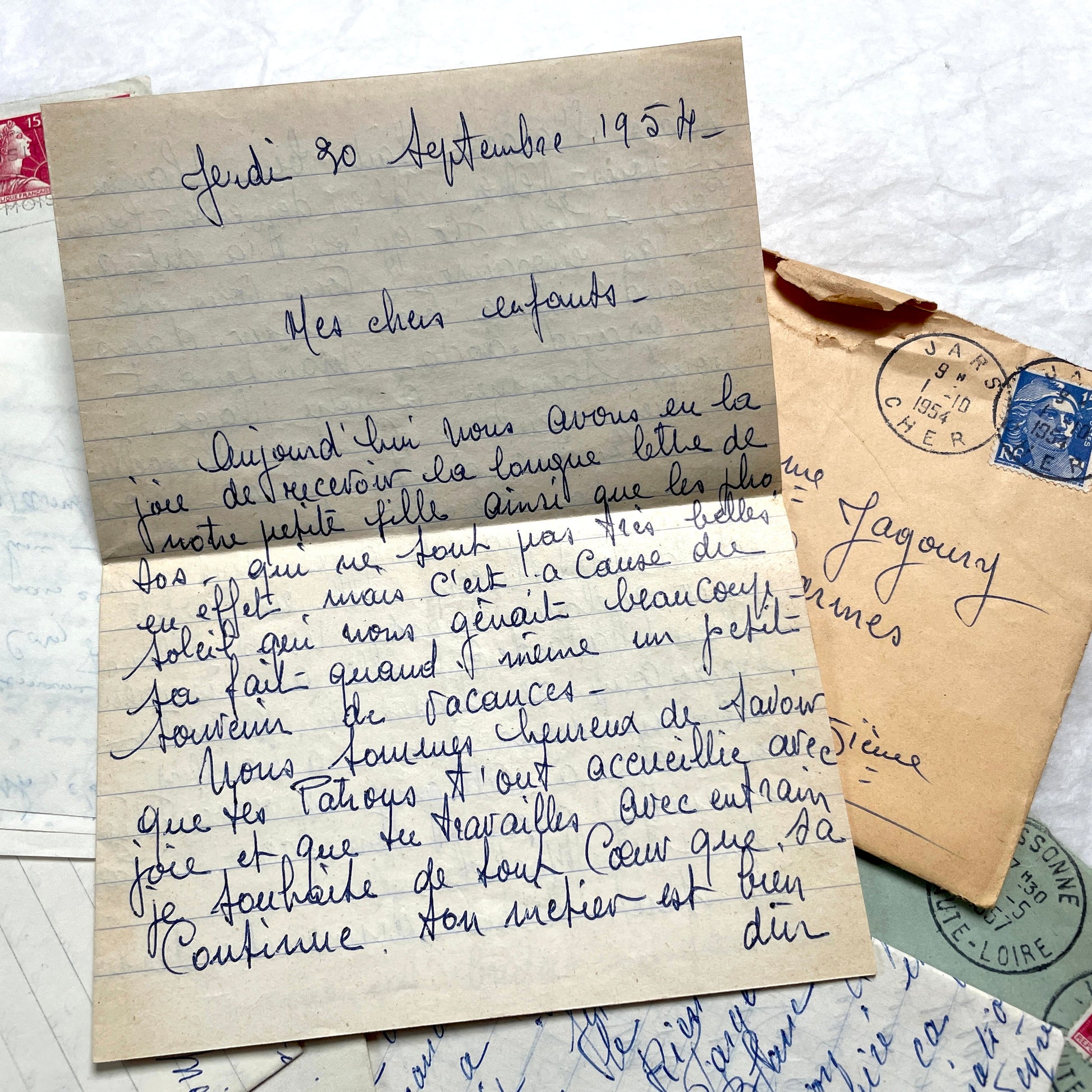 1950s French handwritten letters lot with envelopes and postage stamps, vintage paper ephemera collection.
