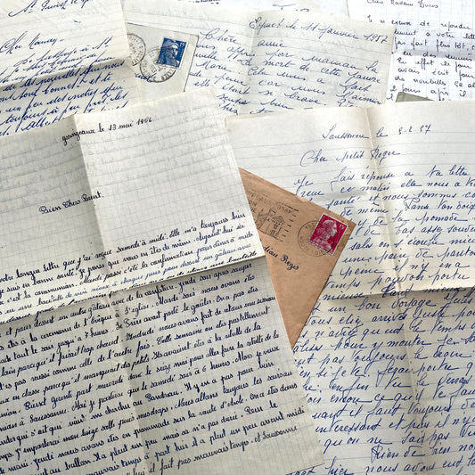 Five French handwritten letters and envelopes from the 1950s, showing cursive script and postal stamps.