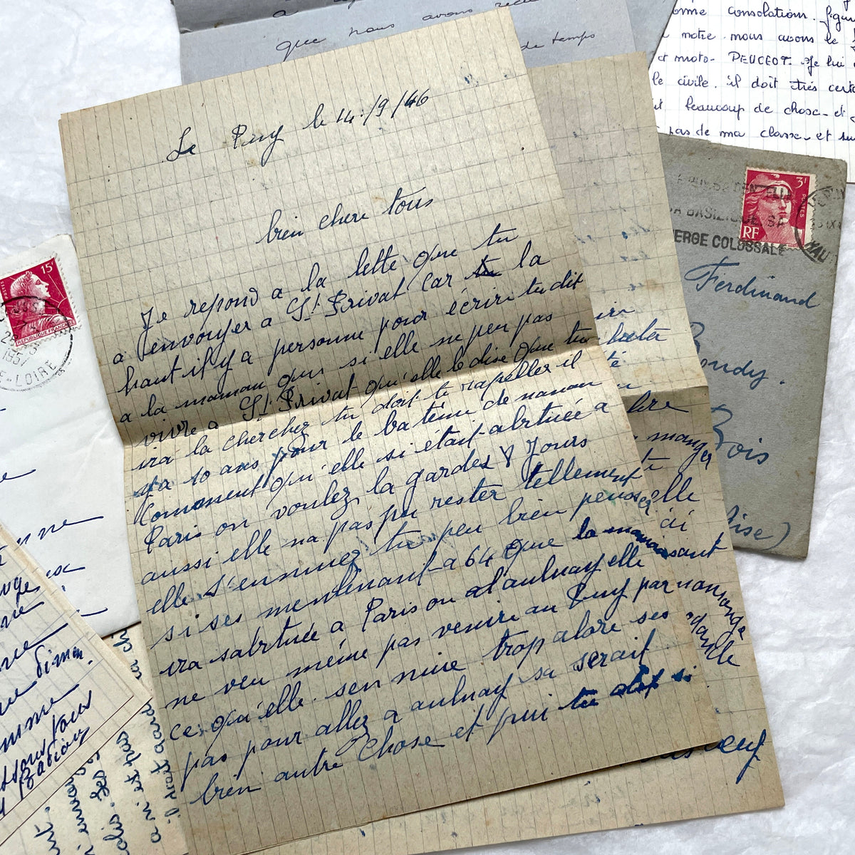 Five French letters from the 1940s and 1950s with handwritten text, original envelopes, and vintage postage stamps.