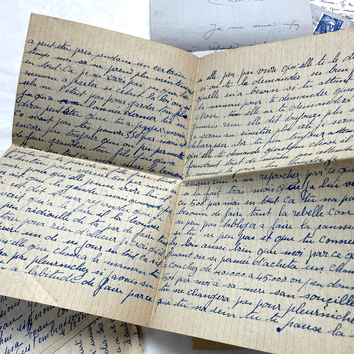 Five French letters from the 1940s and 1950s with handwritten text, original envelopes, and vintage postage stamps.