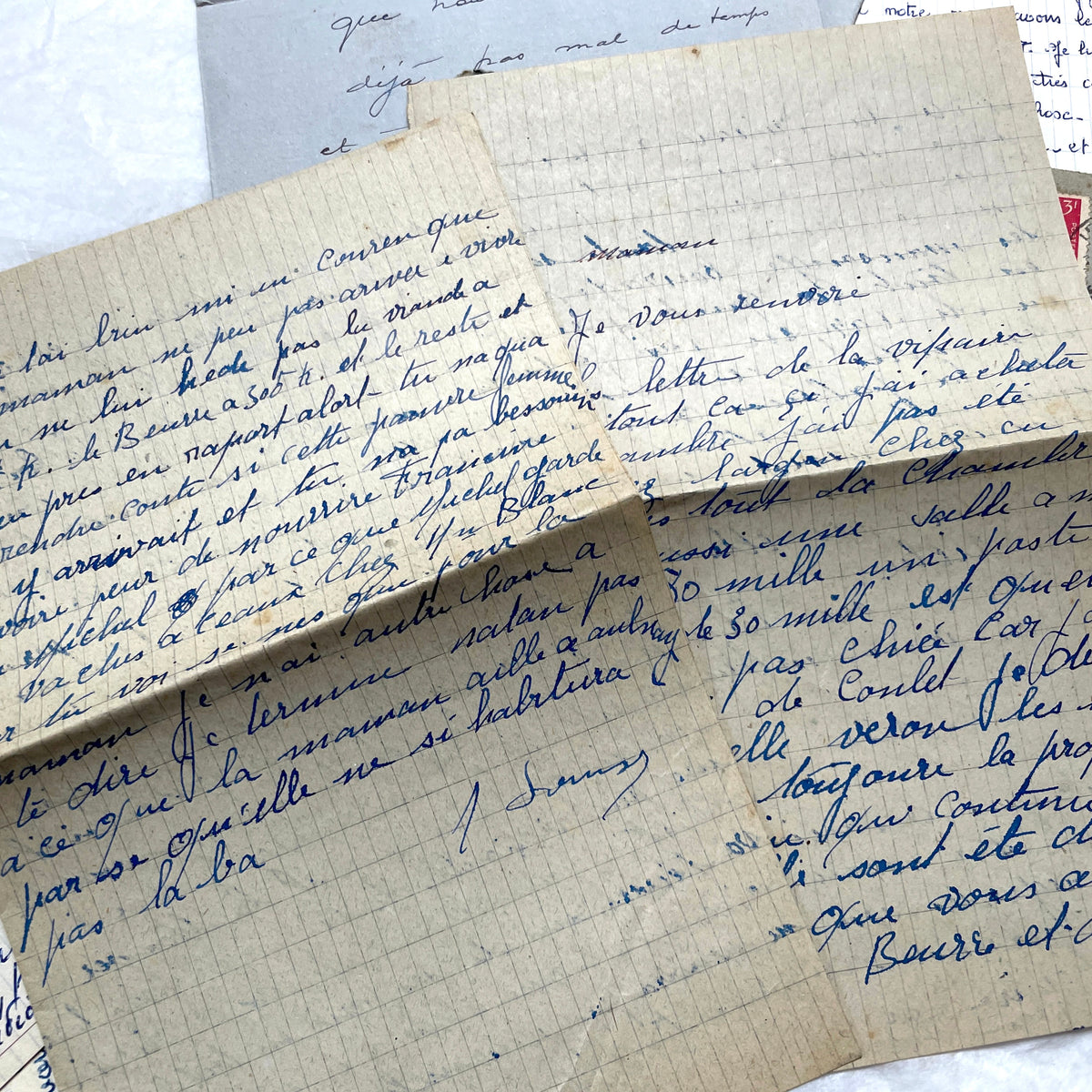 Five French letters from the 1940s and 1950s with handwritten text, original envelopes, and vintage postage stamps.