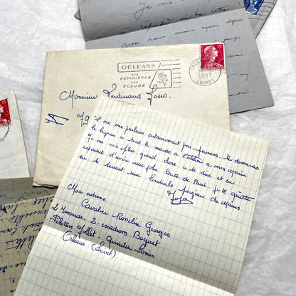 Five French letters from the 1940s and 1950s with handwritten text, original envelopes, and vintage postage stamps.
