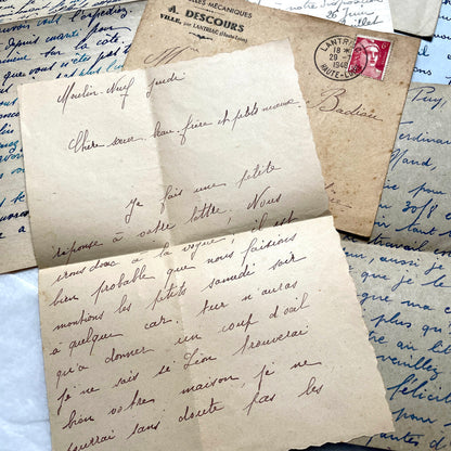 Five handwritten French letters from the 1940s with original envelopes and postage stamps, featuring vintage paper.