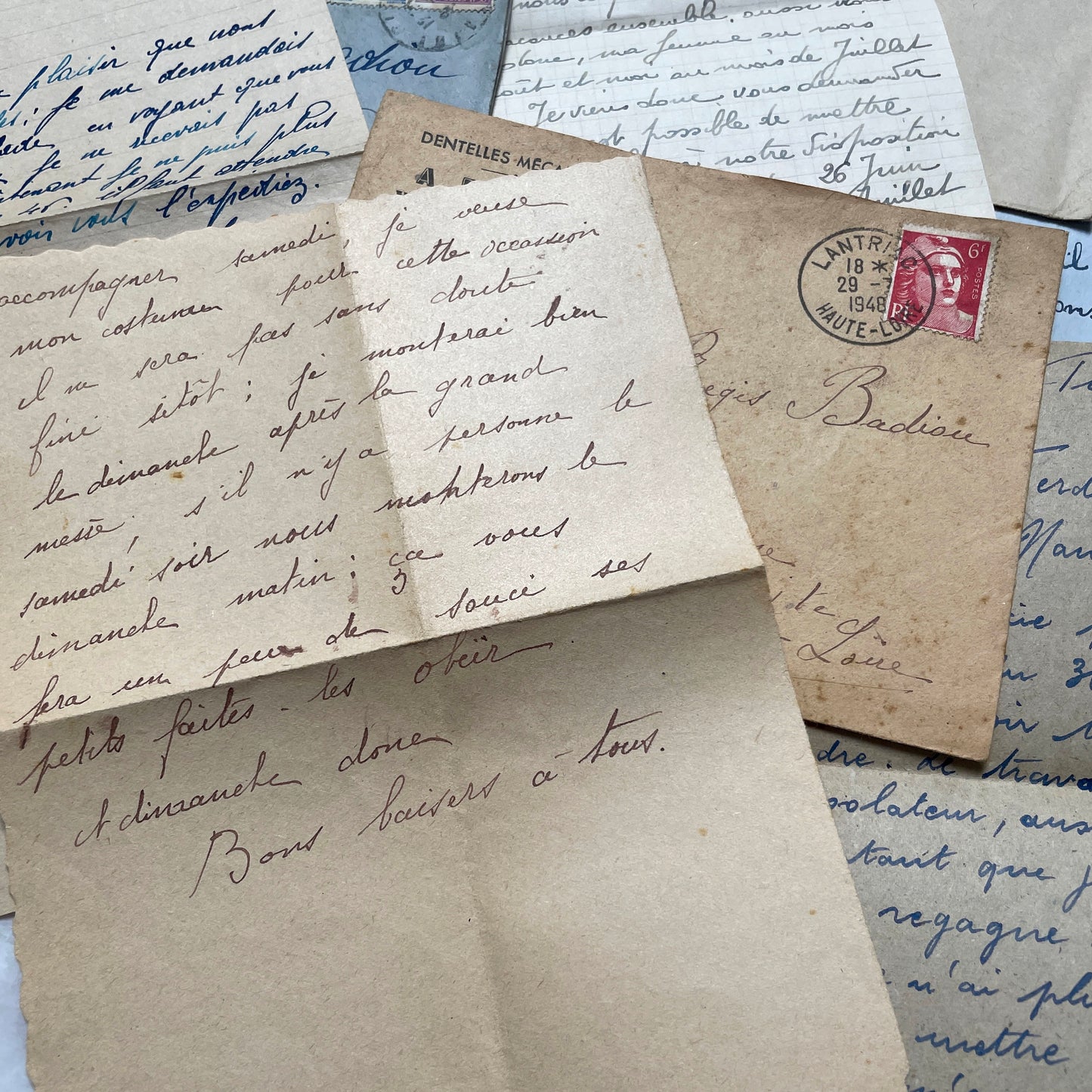 Five handwritten French letters from the 1940s with original envelopes and postage stamps, featuring vintage paper.