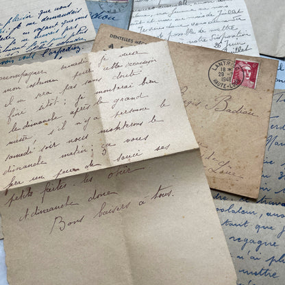 Five handwritten French letters from the 1940s with original envelopes and postage stamps, featuring vintage paper.