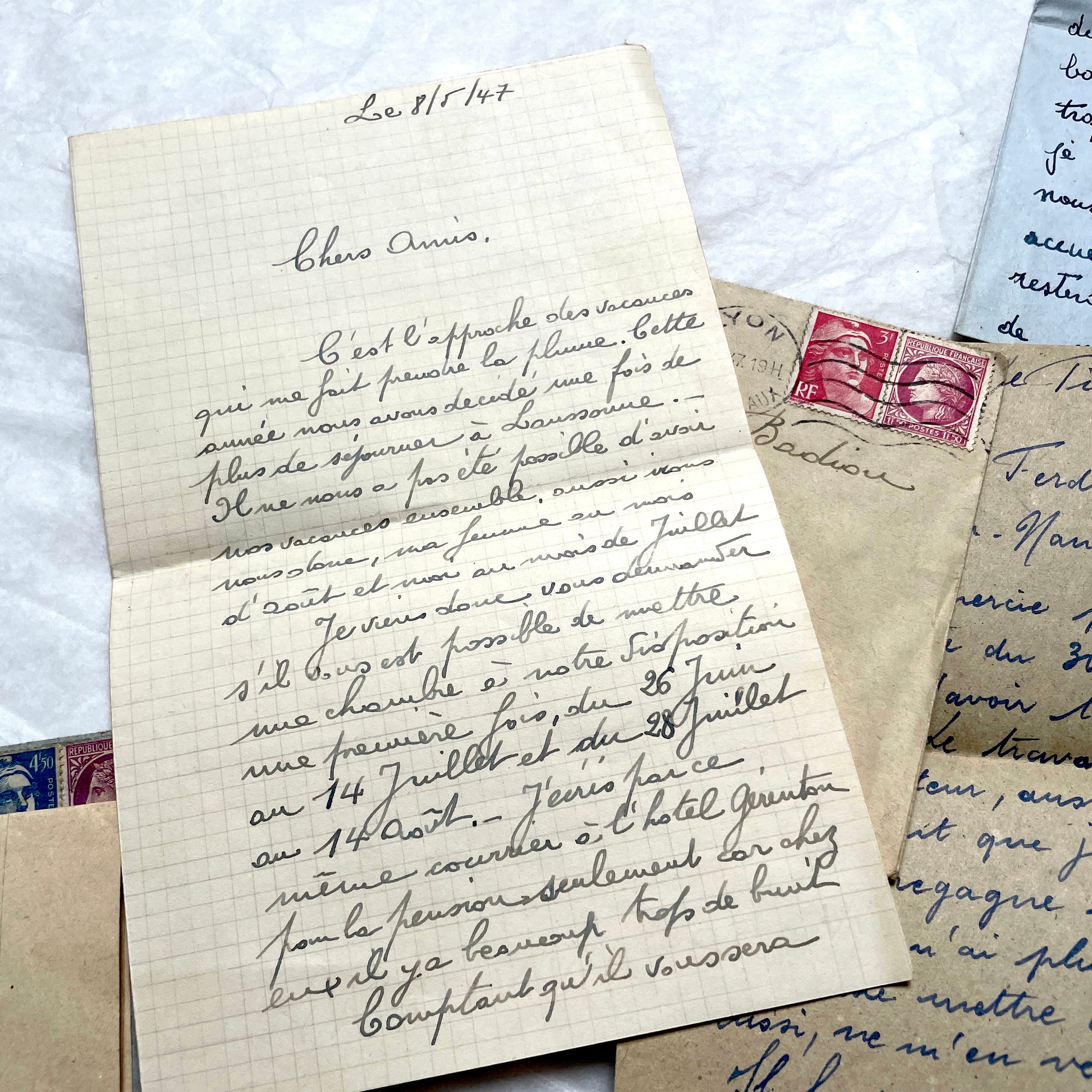 Five handwritten French letters from the 1940s with original envelopes and postage stamps, featuring vintage paper.