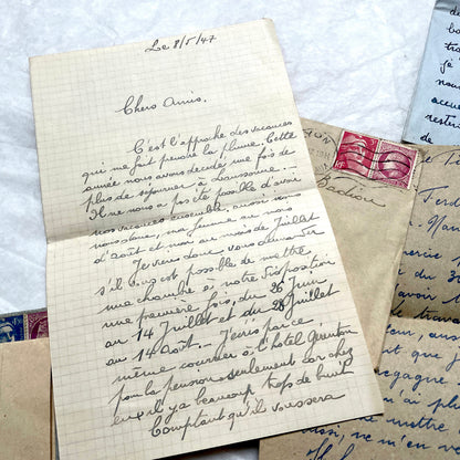 Five handwritten French letters from the 1940s with original envelopes and postage stamps, featuring vintage paper.