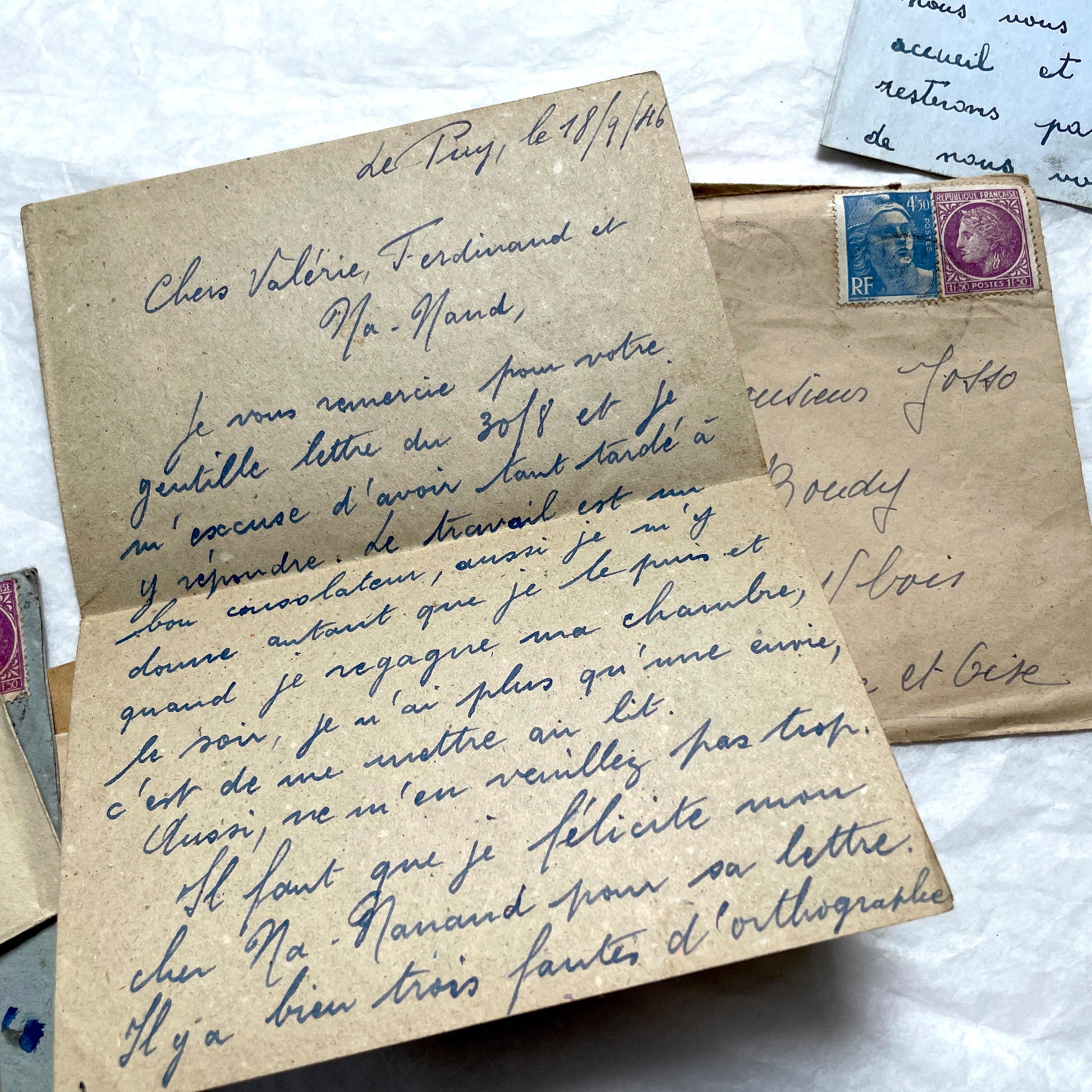 Five handwritten French letters from the 1940s with original envelopes and postage stamps, featuring vintage paper.