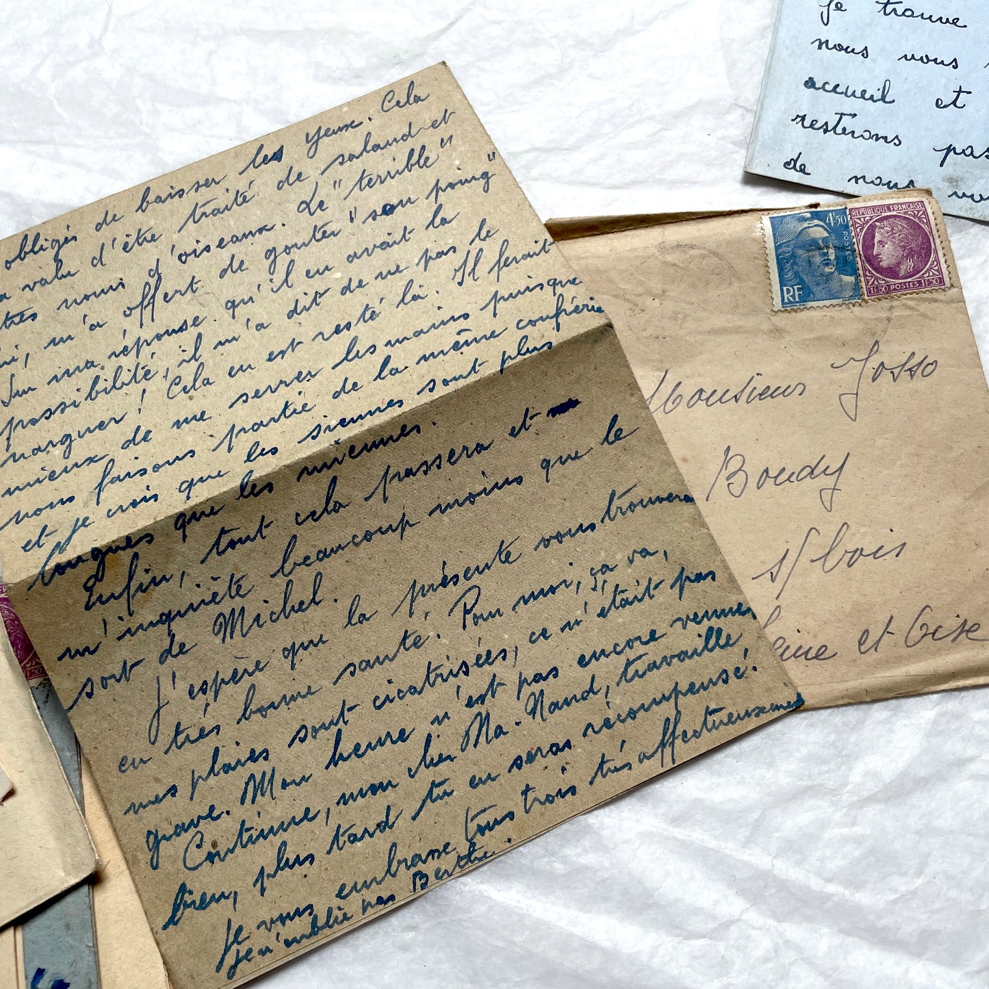 Five handwritten French letters from the 1940s with original envelopes and postage stamps, featuring vintage paper.
