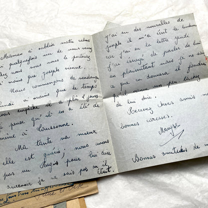 Five handwritten French letters from the 1940s with original envelopes and postage stamps, featuring vintage paper.