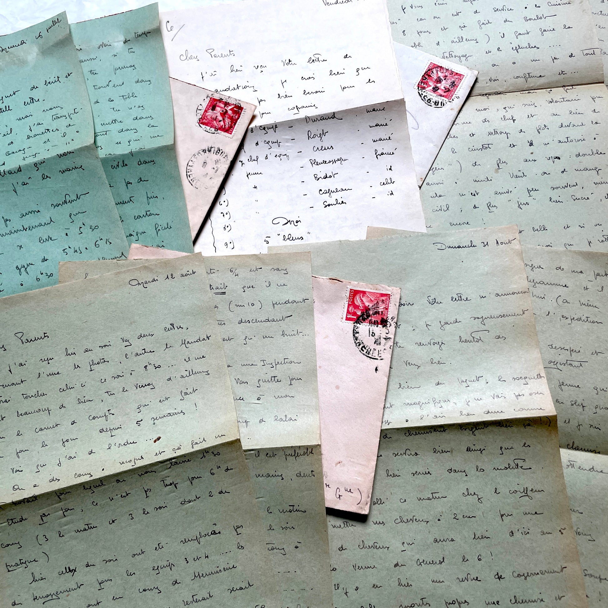 1930s French handwritten letters set with envelopes, showing cursive script, postage stamps, and postmarks.