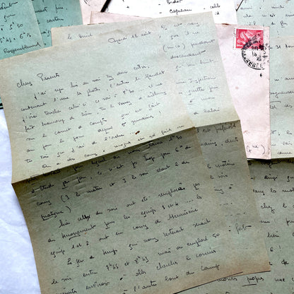 1930s French handwritten letters set with envelopes, showing cursive script, postage stamps, and postmarks.