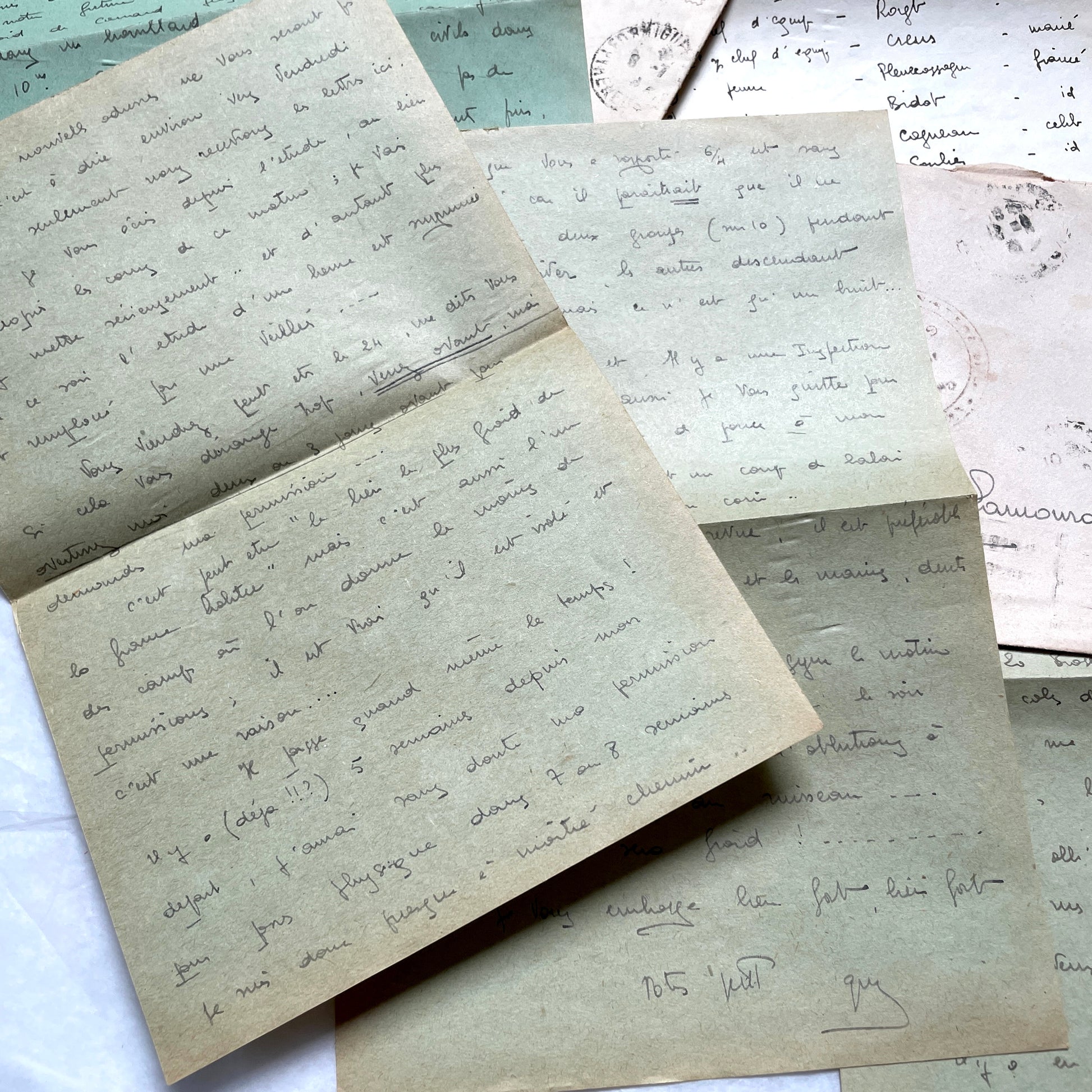 1930s French handwritten letters set with envelopes, showing cursive script, postage stamps, and postmarks.
