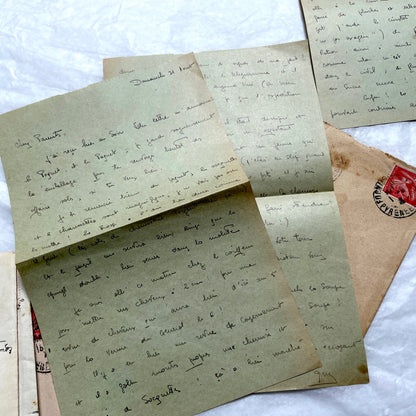 1930s French handwritten letters set with envelopes, showing cursive script, postage stamps, and postmarks.