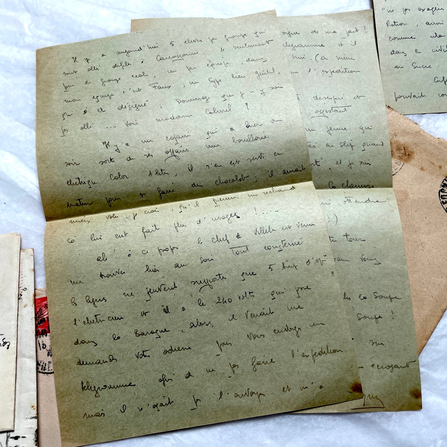1930s French handwritten letters set with envelopes, showing cursive script, postage stamps, and postmarks.