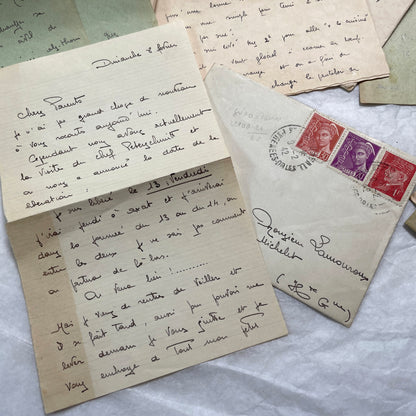 Five French handwritten letters and envelopes from the 1940s, featuring period postage stamps and script.